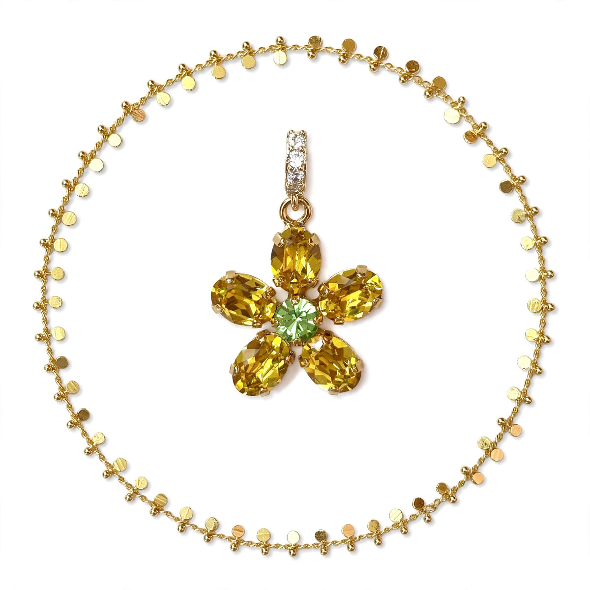 The Pendant of Splendour Fluette gold flower pendant — Mink & Davernay